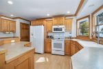 Kitchen has everything you would need for a meal at home